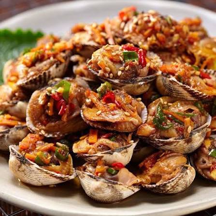 Korean kkomak seasoned cockles served with rice